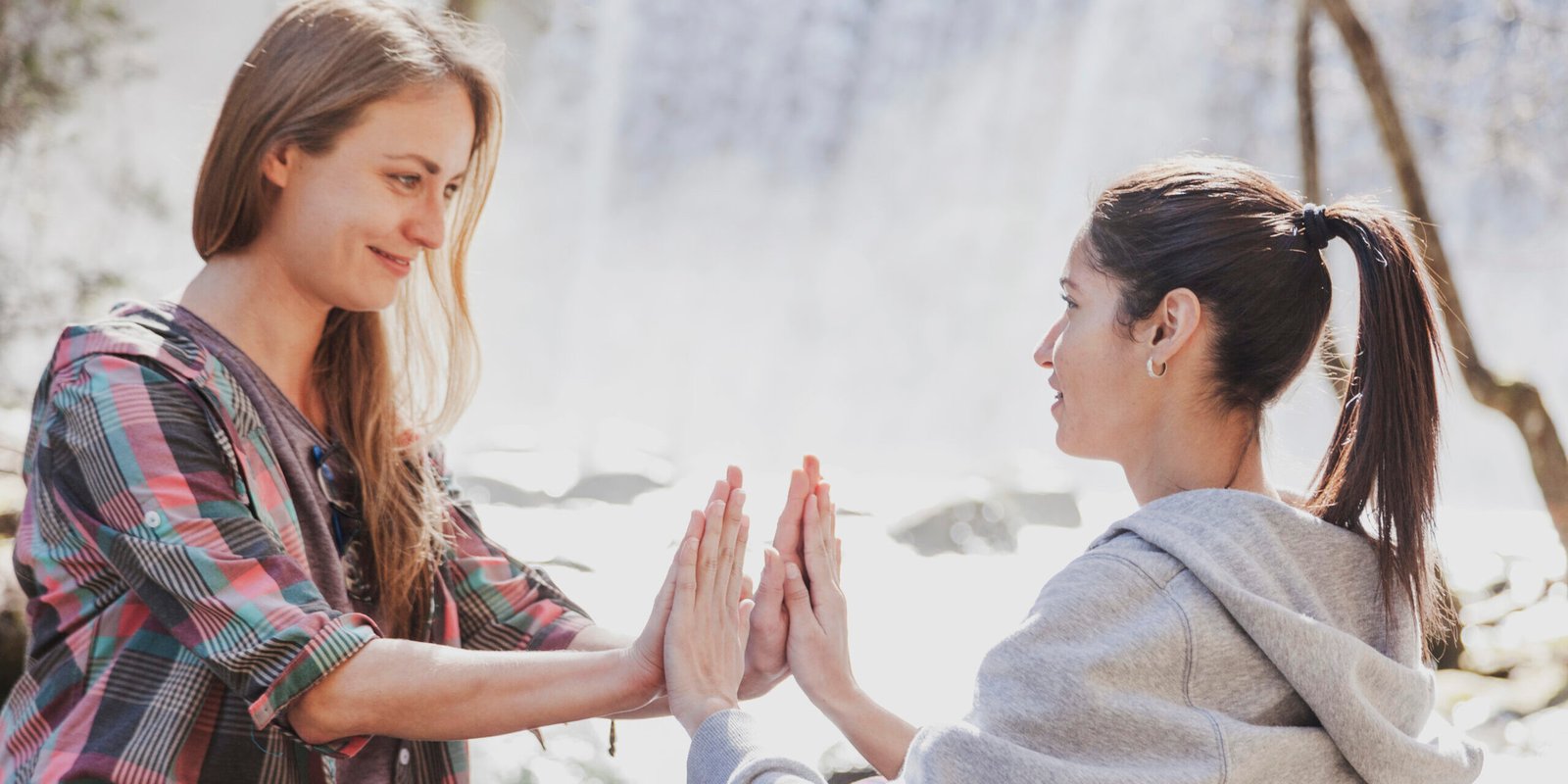 relaxed-girls-with-hands-together